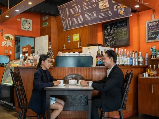 Various amenities offered at Stonestown Suites, including café, spa, gym, and meeting spaces